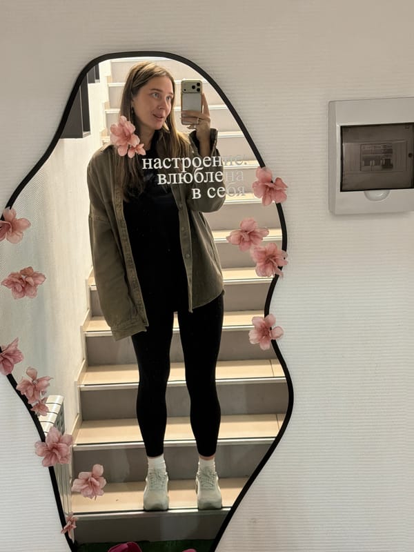 Woman takes mirror selfie in Chaikovsky, Russia