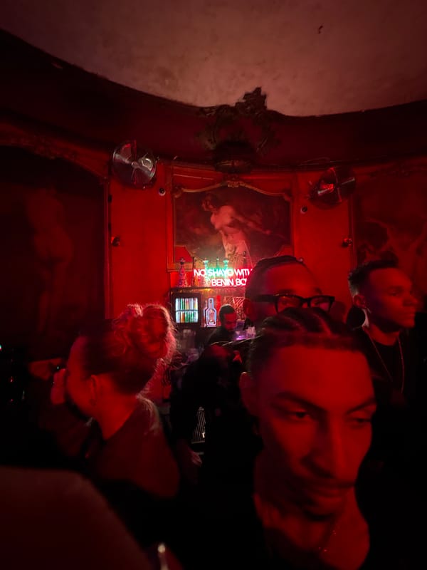 Late night socializing captured at Paris bar