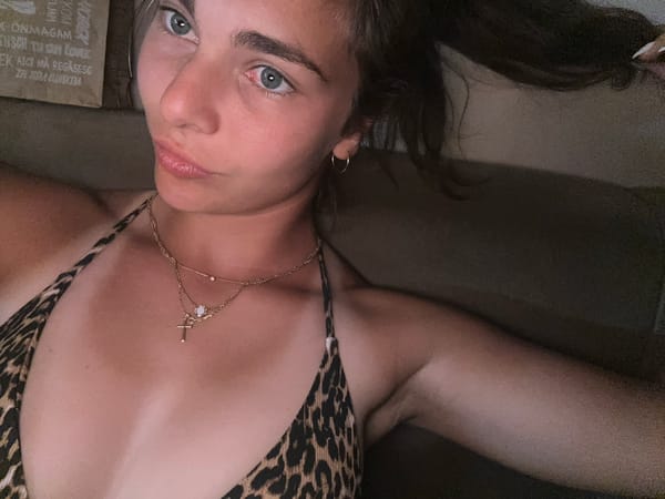 Woman in leopard print photographed indoors in Kashin, Bulgaria