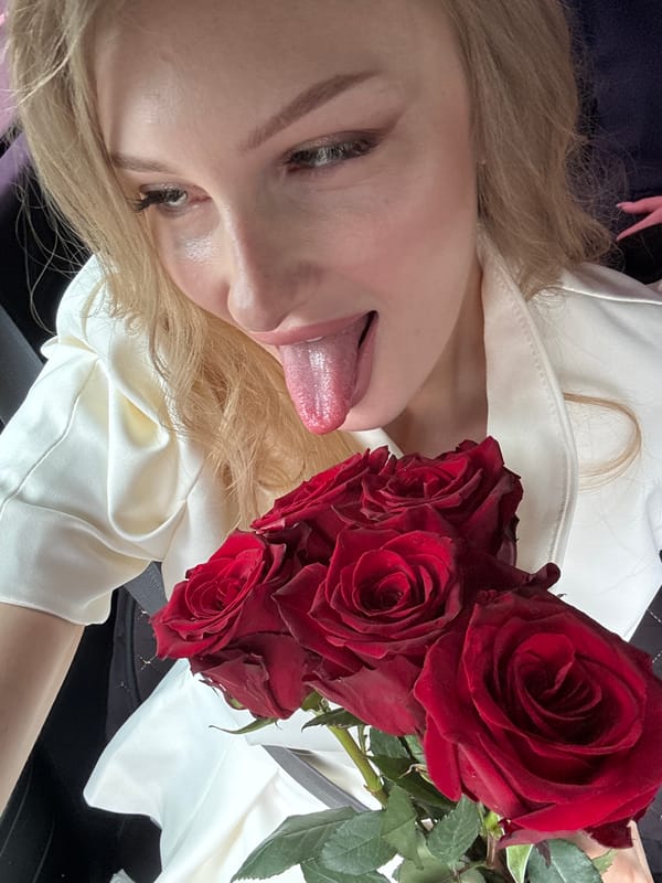 Red roses and selfies in a parked car, Perm