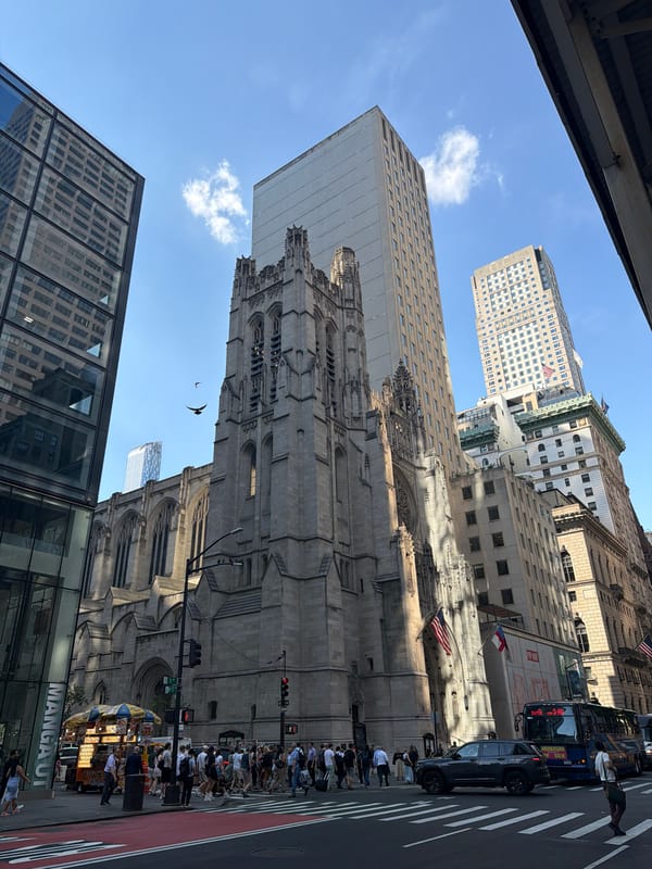 Street view captures Trinity Church amid NYC buildings