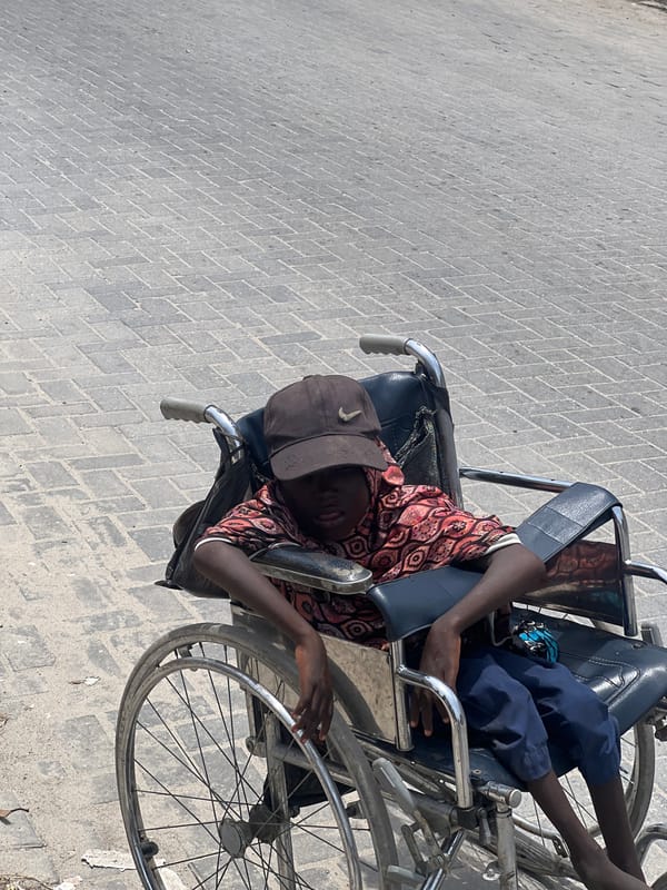 Young person in wheelchair spotted in Alaguntan, Nigeria