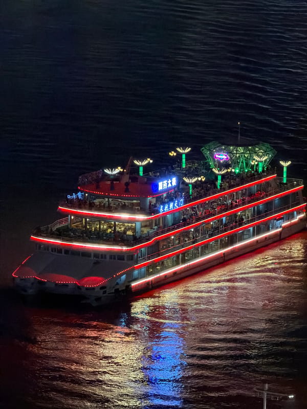 Chongqing's Yuzhong waterfront lights up after dark