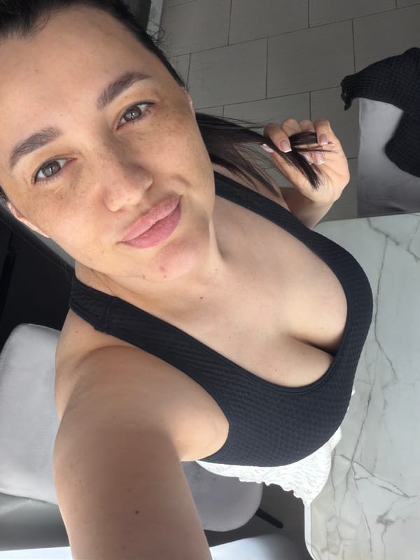 Woman takes selfies in Russian residential area