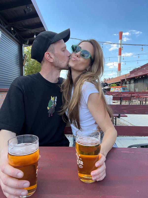 Couple photographed dining outdoors in Belgrade restaurant