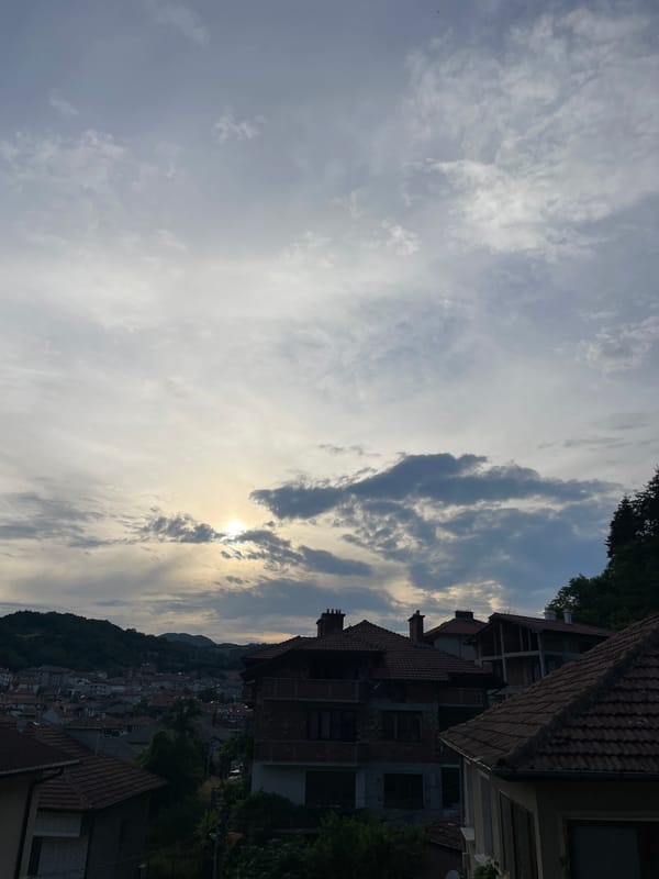 Zlatograd hillside town under a shifting afternoon sky