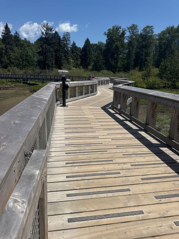 Rocky Point Park boardwalks, tidal flats, and Port Moody streets