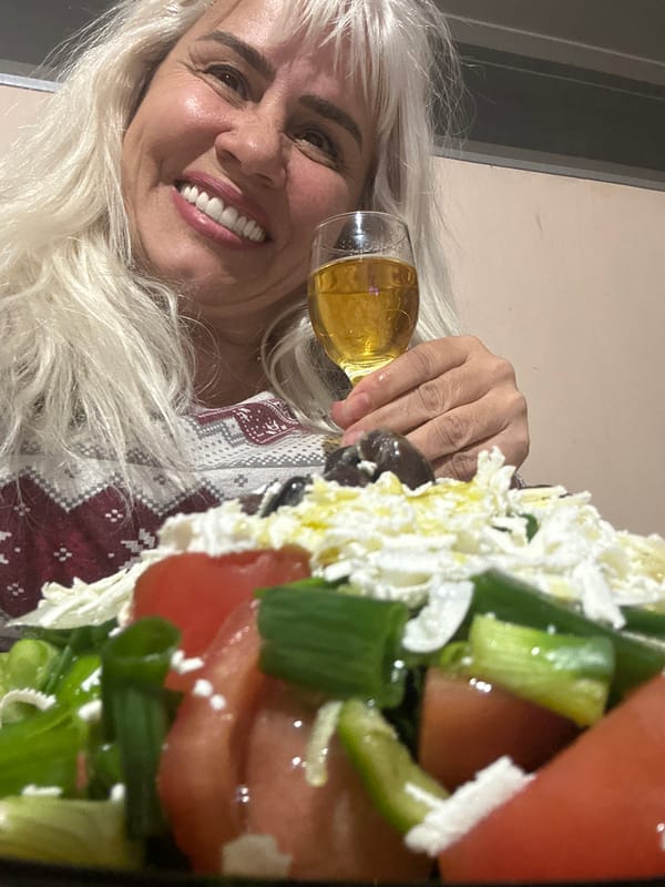 Person enjoys fresh strawberries in Sofia container