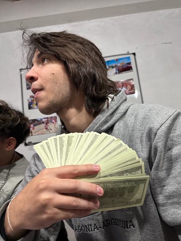 Man displays cash fan in Catamarca, Argentina
