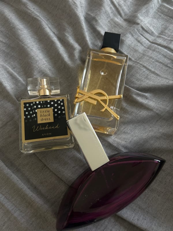 Personal items including perfume bottles and toys documented