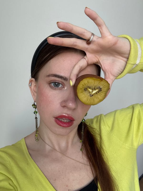 Woman poses with kiwi fruit in Moscow photo session