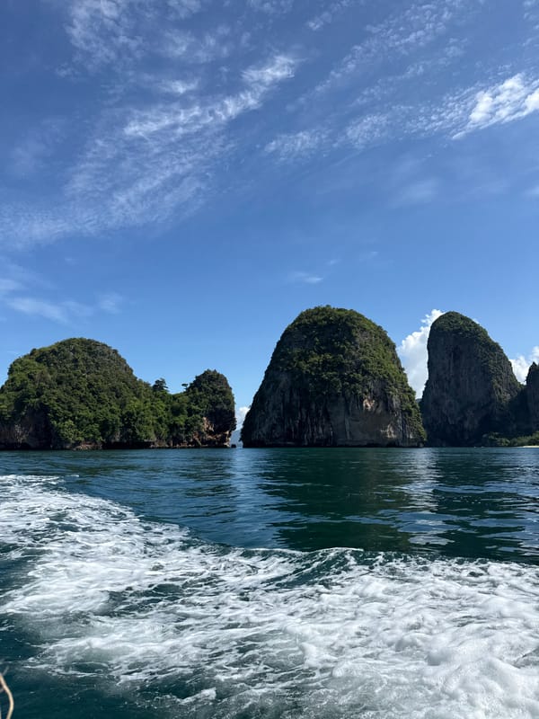 Boat journey past karst islands in Ao Nang waters
