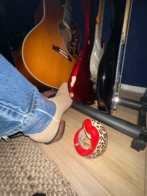 Young musician records acoustic guitar session in Paris studio