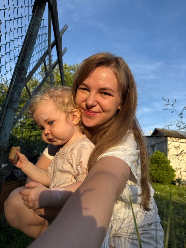 Family visits chicken coop in Russian village afternoon