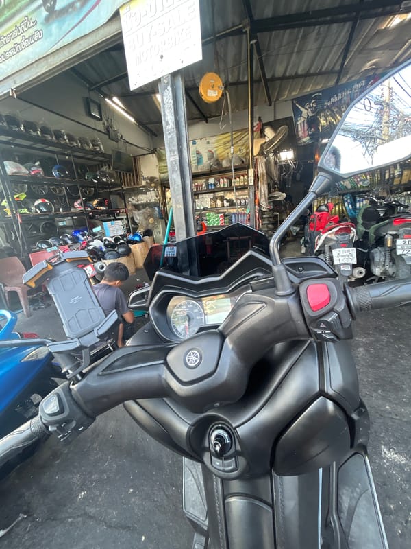 Scooters, a workshop, and street life in Ko Samui