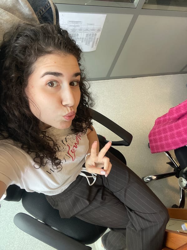 Woman documents morning office routine in Sofia with selfies