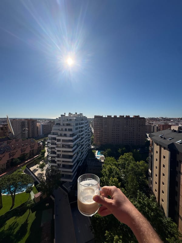 Morning espresso moment captured overlooking València cityscape