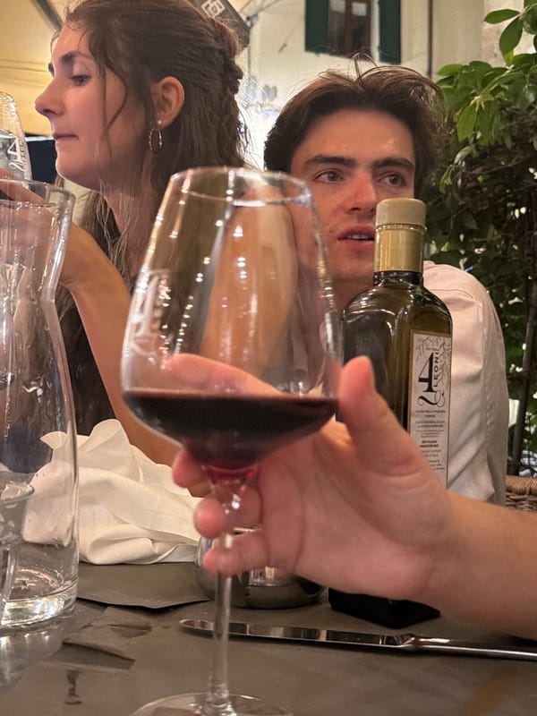 Couple dines outdoors in Florence evening