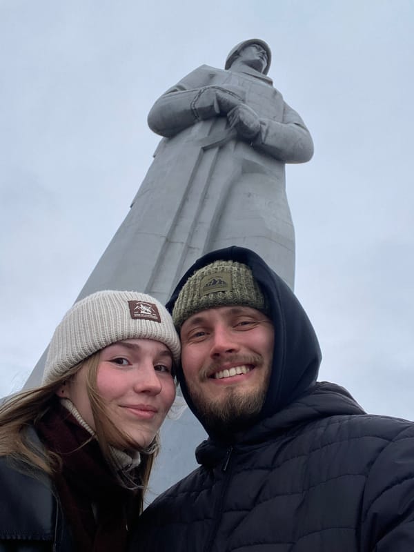 Couple takes selfie at monument in Murmansk