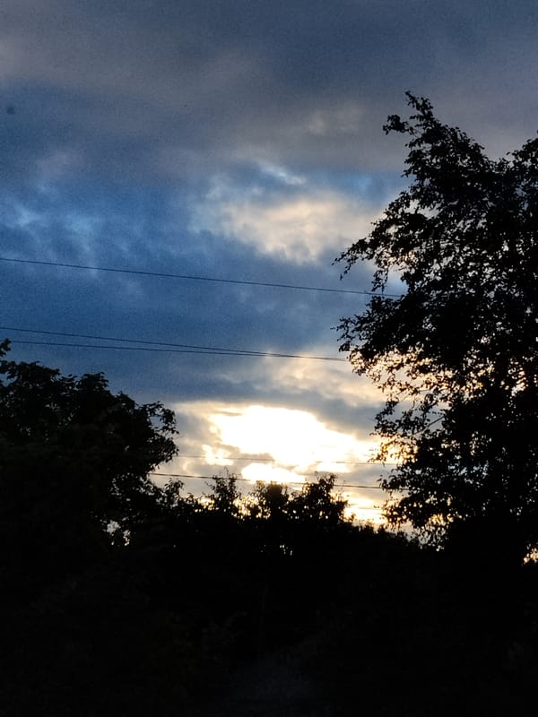 Dusk skies and everyday life in a Ukrainian village