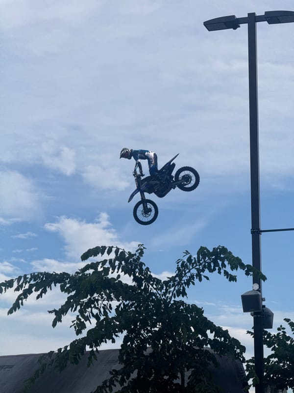 Motocross rider goes airborne on a dirt bike in Calgary