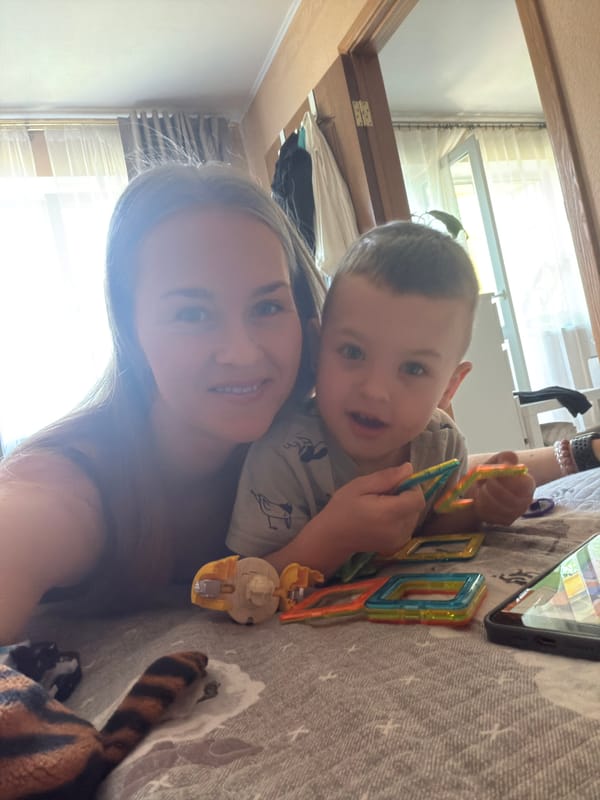 Mother and child share quiet domestic moments in Khabarovsk