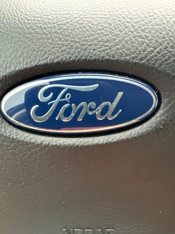 Rainy afternoon inside a Ford, Vitebsk streets outside