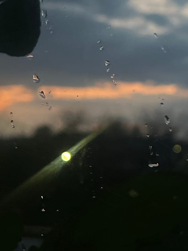 Dramatic orange sunset observed through storm clouds in Votkinsk