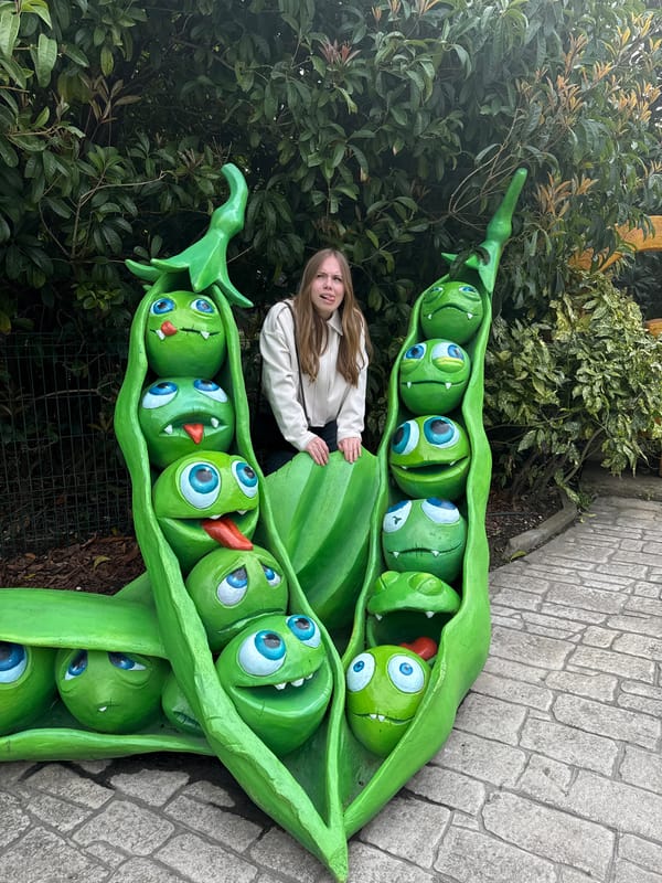 Tourist explores whimsical sculptures at Sochi Park, Russia