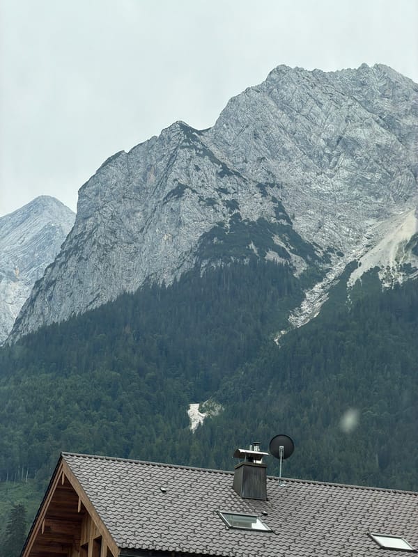 Grainau village and alpine peaks under overcast summer skies