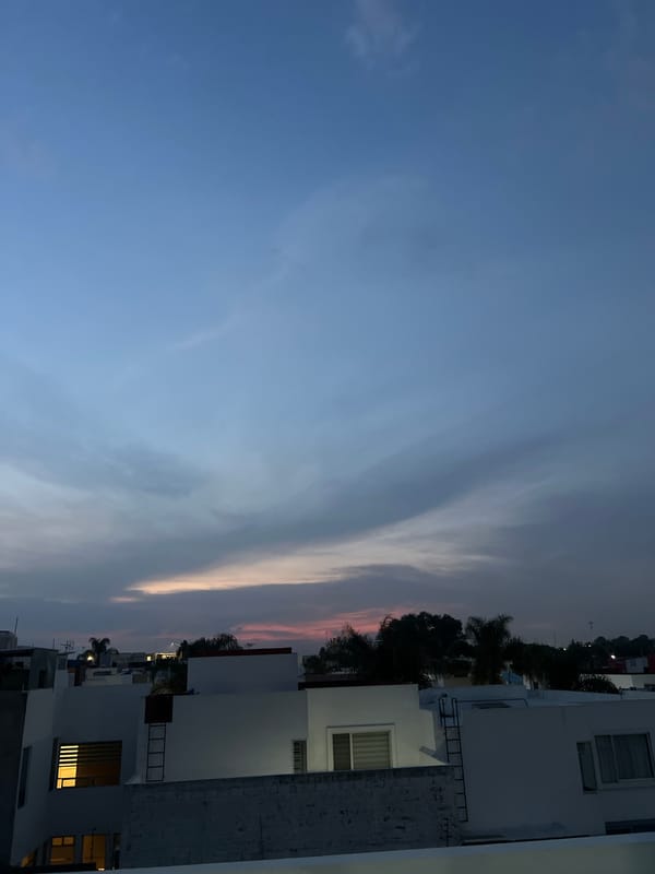 Twilight sky documented over Cholula, Mexico urban landscape