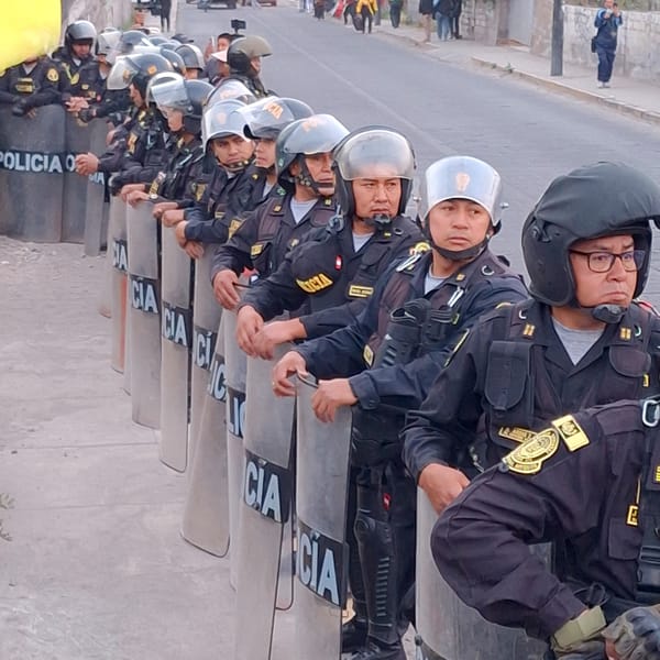 Anti-Fujimori protesters confront riot police outside Arequipa rally venue