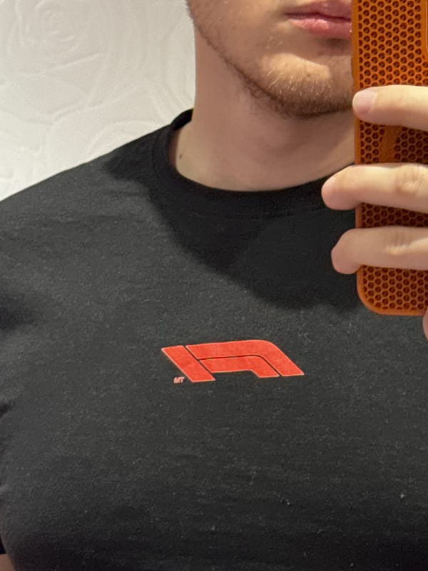 Man takes mirror selfie in Formula 1 shirt in Plovdiv
