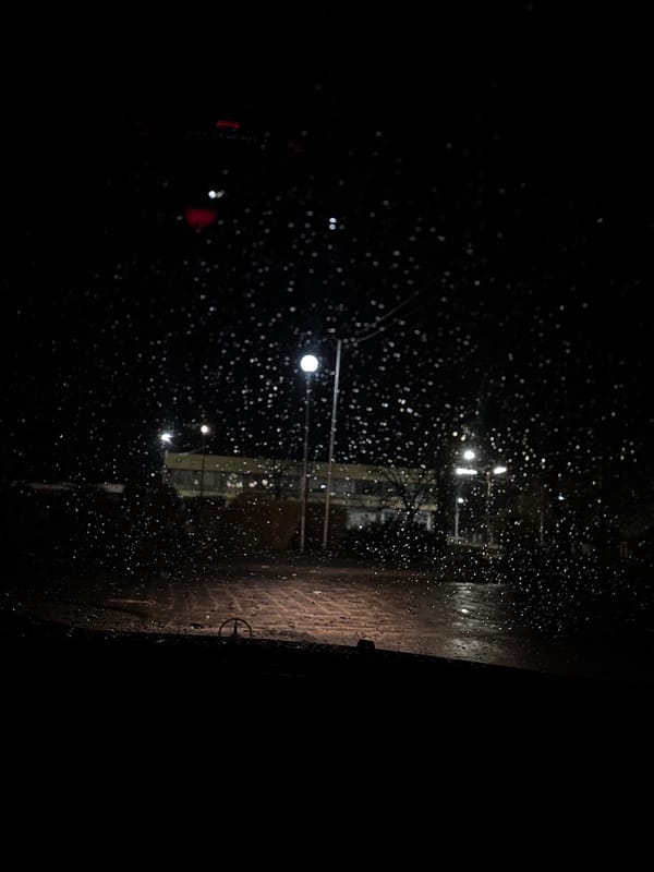 Rainy night creates streaked window views in Karlovo