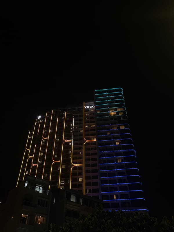 Nha Trang beachfront at night under a full moon