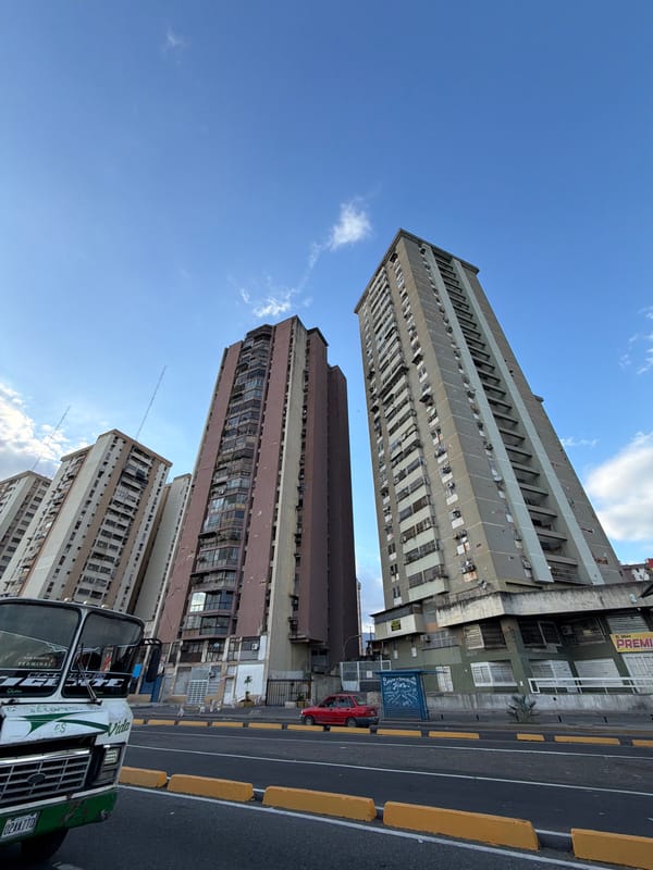 Aging apartment towers in Maracay show wear and structural deterioration
