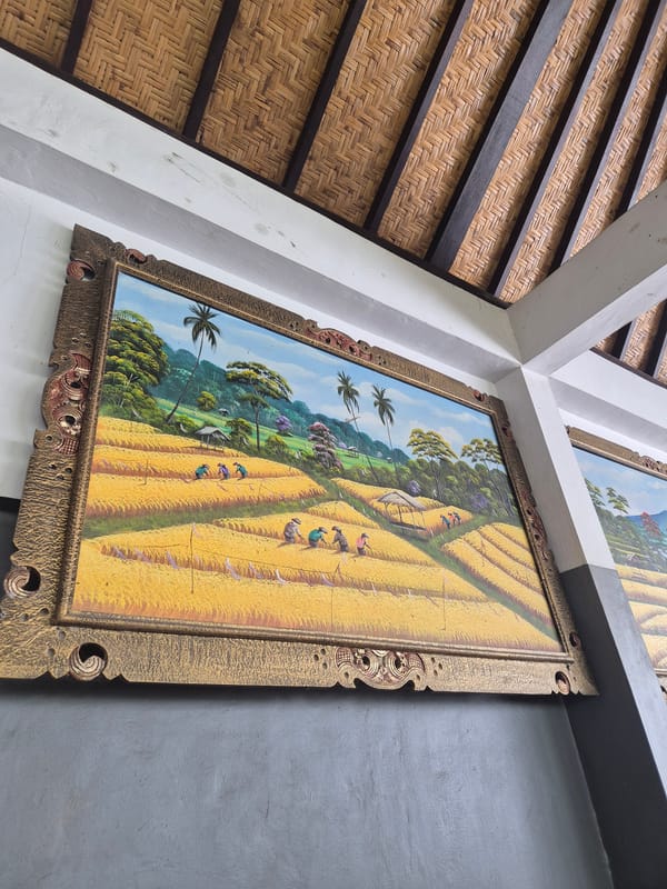 Ornate framed painting observed on interior wall in Canggu