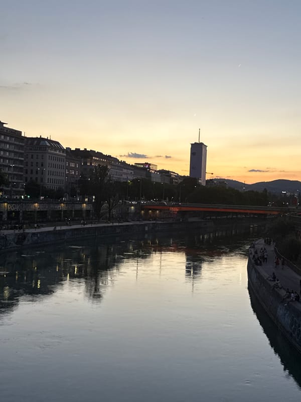 Dusk along the Danube Canal and Vienna's city streets