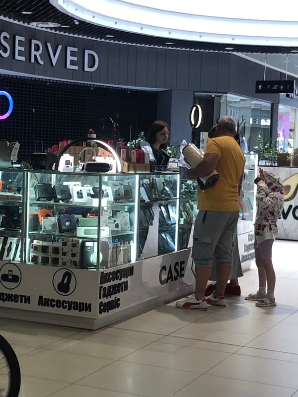 Afternoon foot traffic inside a Chernihiv shopping mall