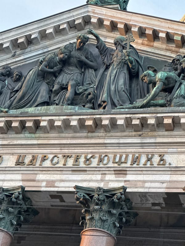 Tourist documents St. Isaac's Cathedral facades and surroundings