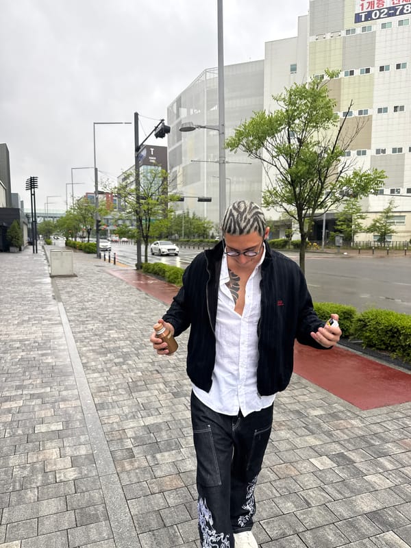 Man with zebra-striped hair spotted on Gimpo-si sidewalk