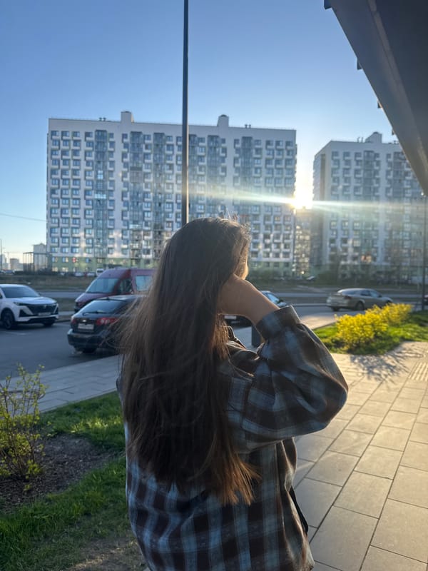 Woman in plaid shirt observed outdoors in Russia