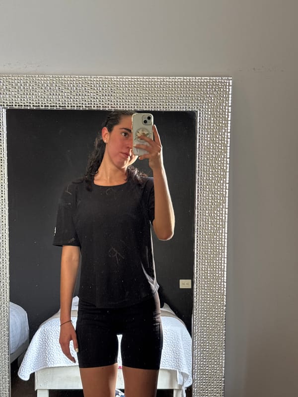 Woman takes mirror selfie in San Bernardino Tlaxcalancingo