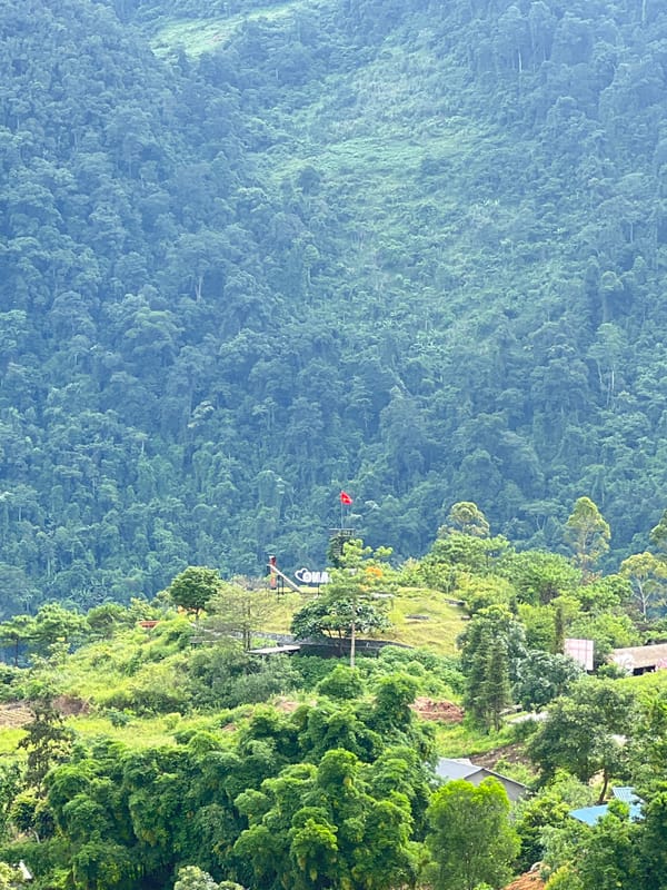 Morning stop in a misty Vietnamese mountain valley