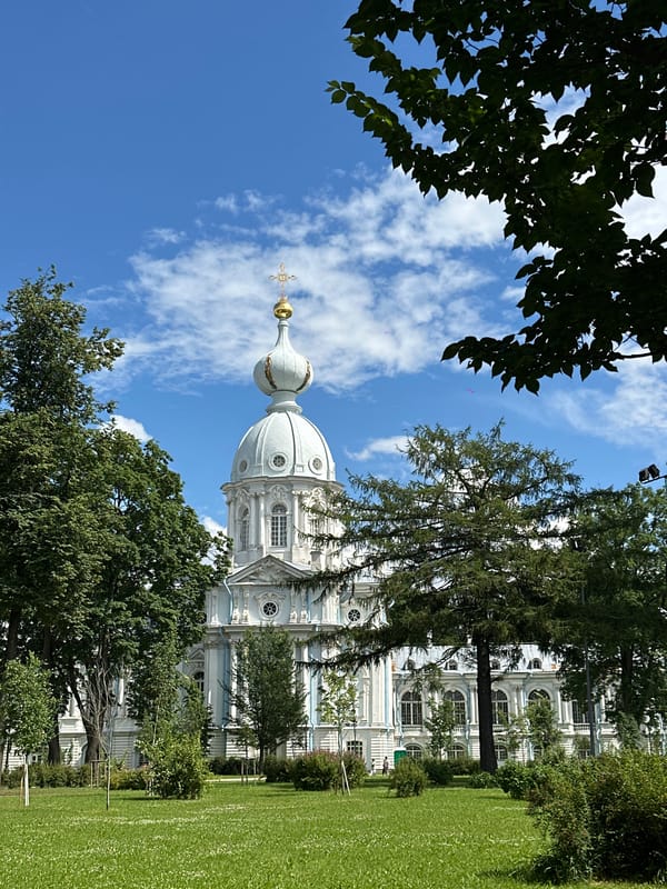 Smolny Cathedral and its park grounds on a summer morning