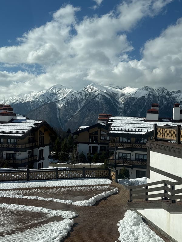 Winter mountain landscape with alpine buildings documented in Russia