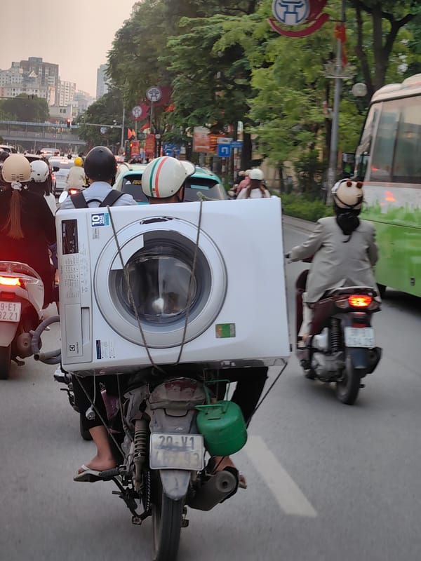 Rush hour traffic documented at busy Hanoi intersection