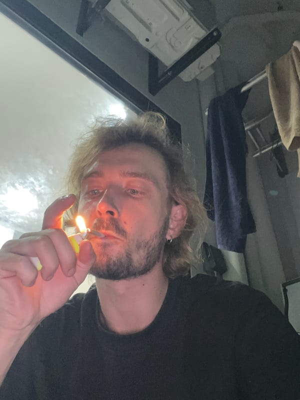 Man photographed with lit lighter at Vietnam heritage site