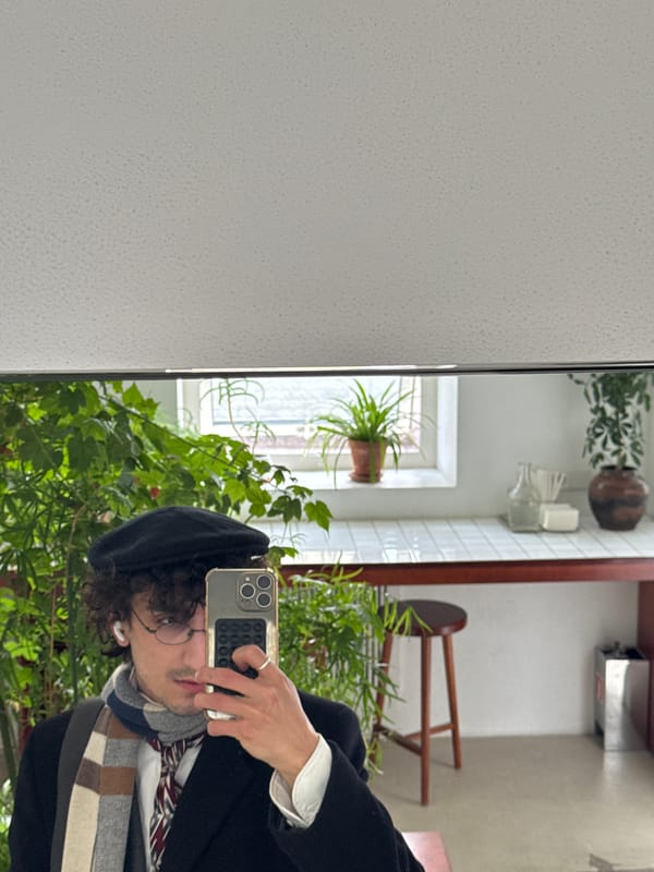 Moscow resident takes mirror selfie in plant-filled room