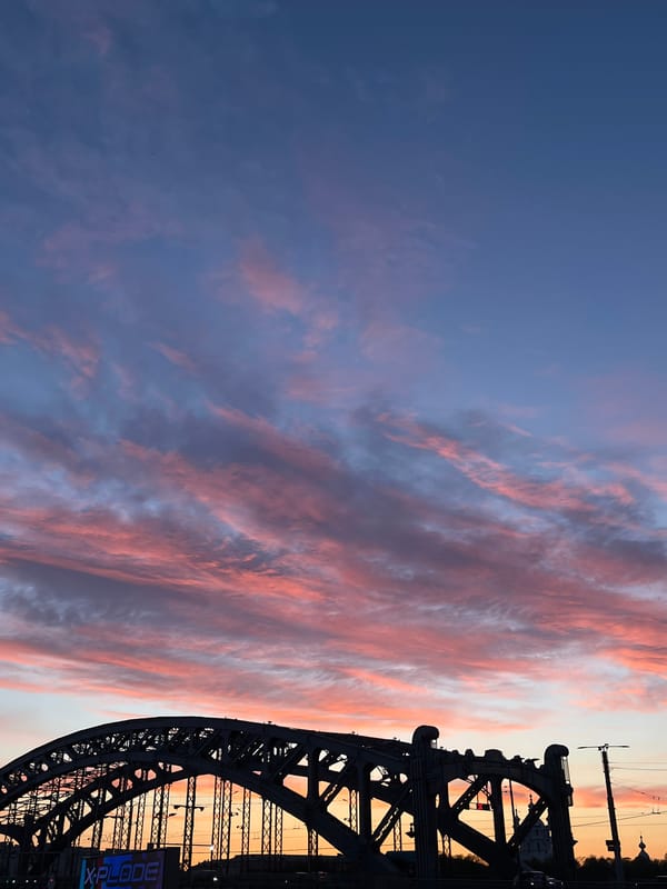 Saint Petersburg evening skies captured with bridge, tram lines